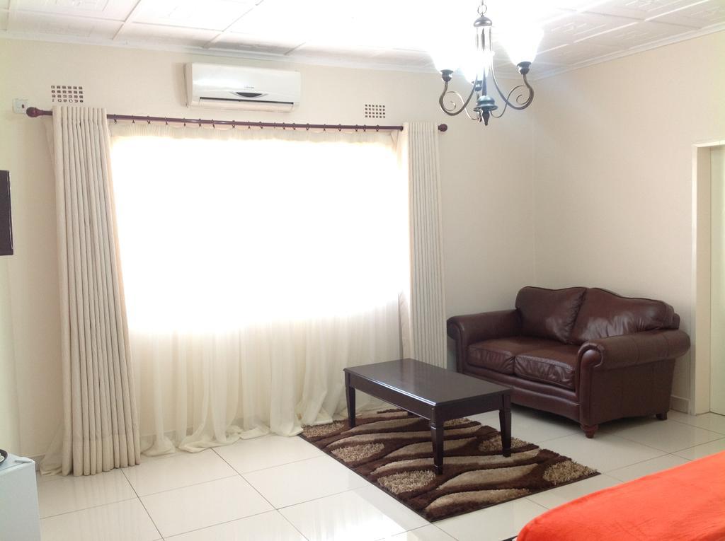 Cypress Executive Lodge Livingstone Habitación foto